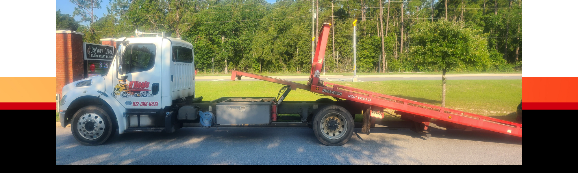 Flatbed tow truck